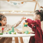 Preschool students playing with blocks